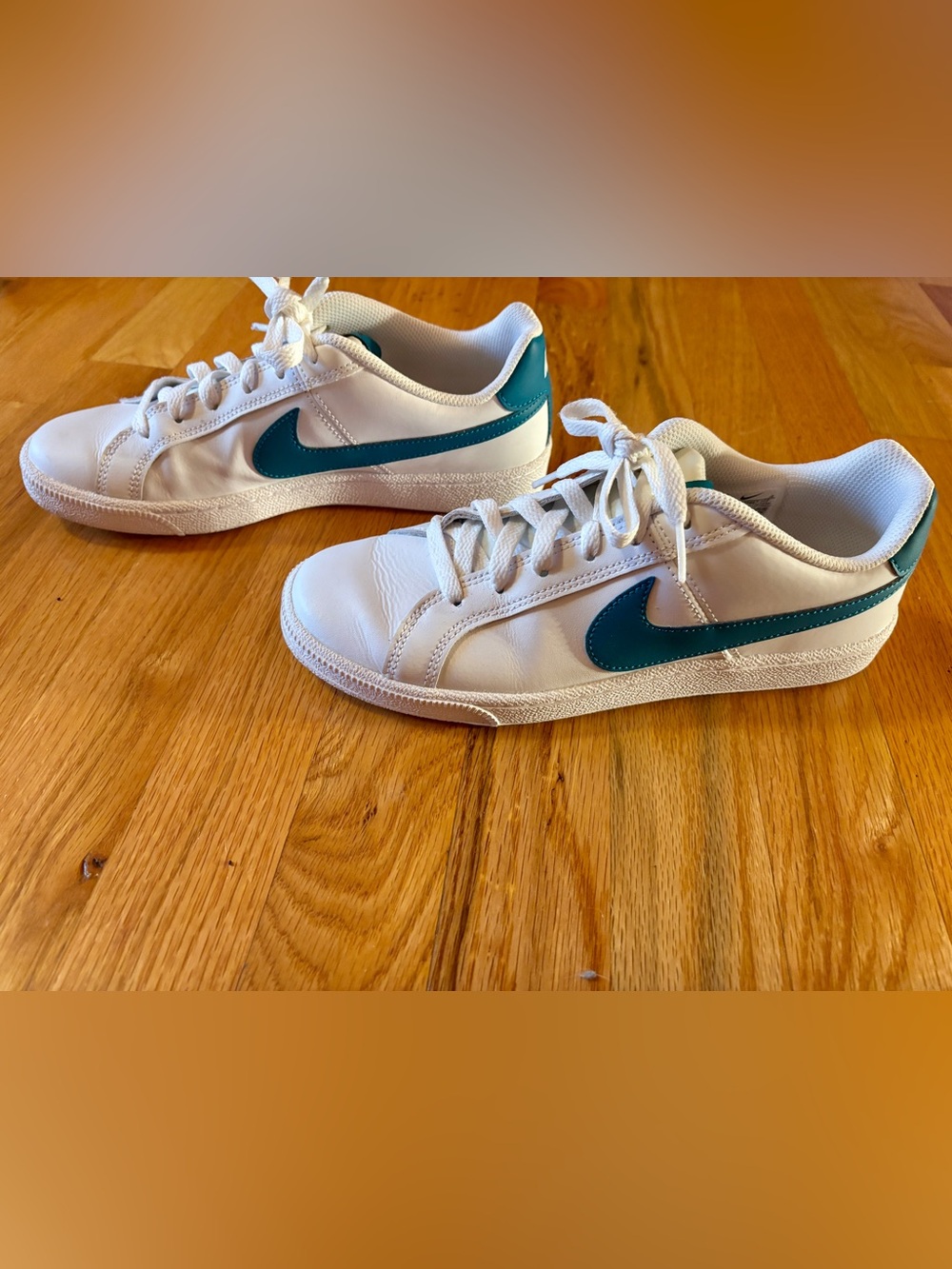 Nike Women's White Sneakers with Teal Swoosh
